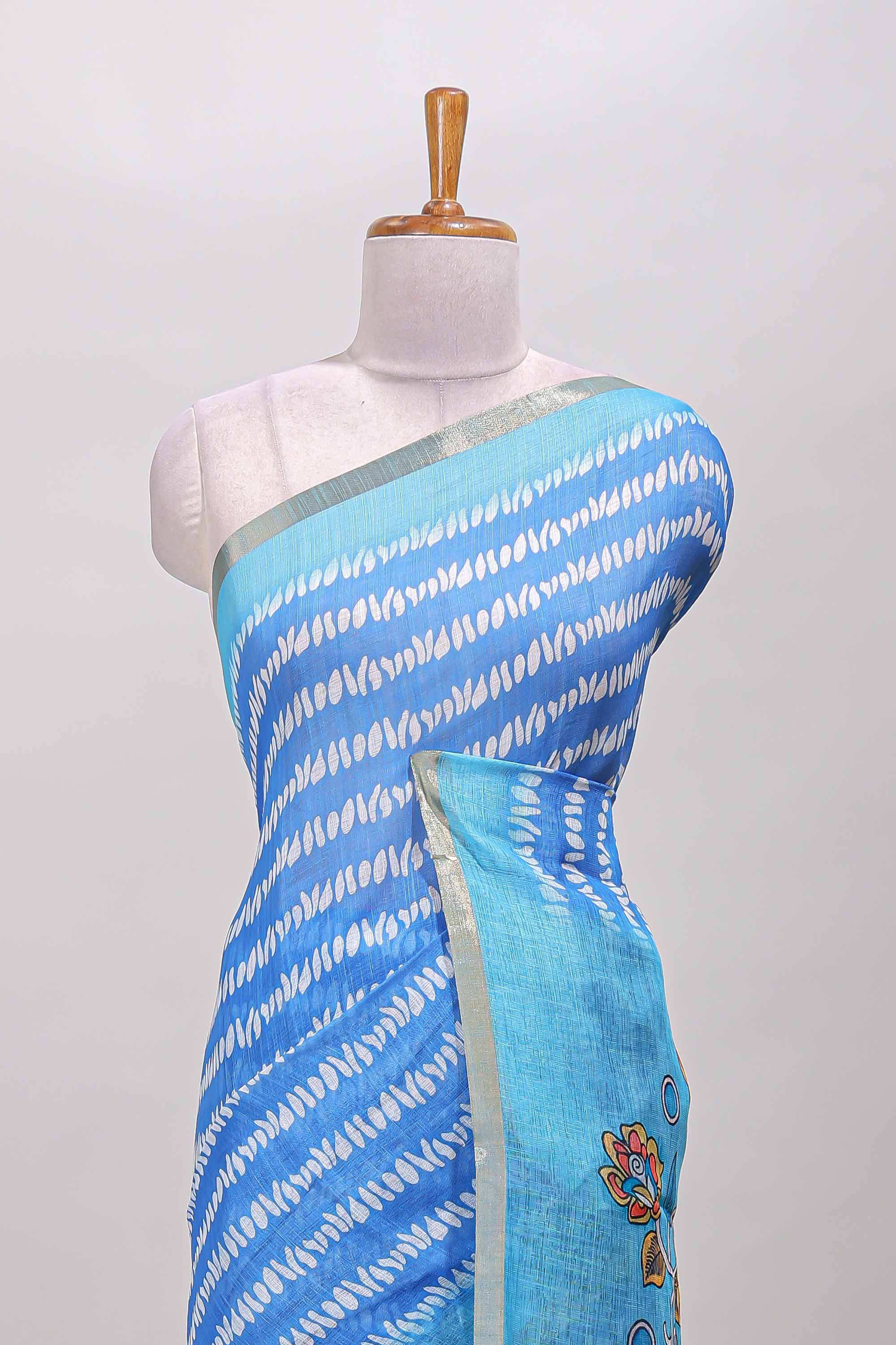 Blue linen saree with self zari border