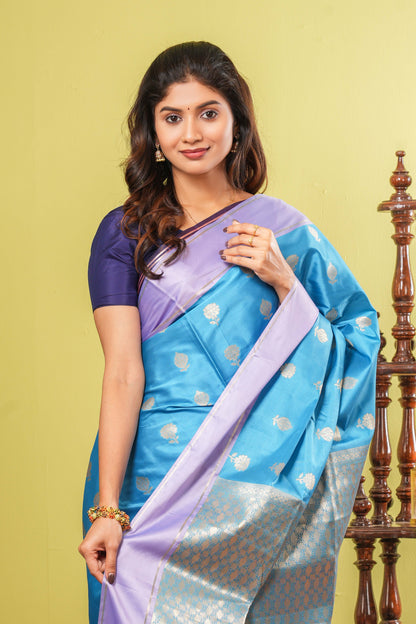 Blue semi soft silk contrast border saree