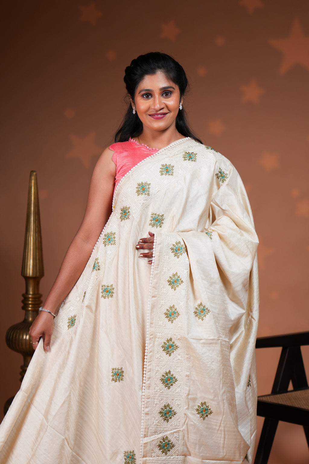 Cream embroidery floral motifs design raw silk saree with self border and matching blouse