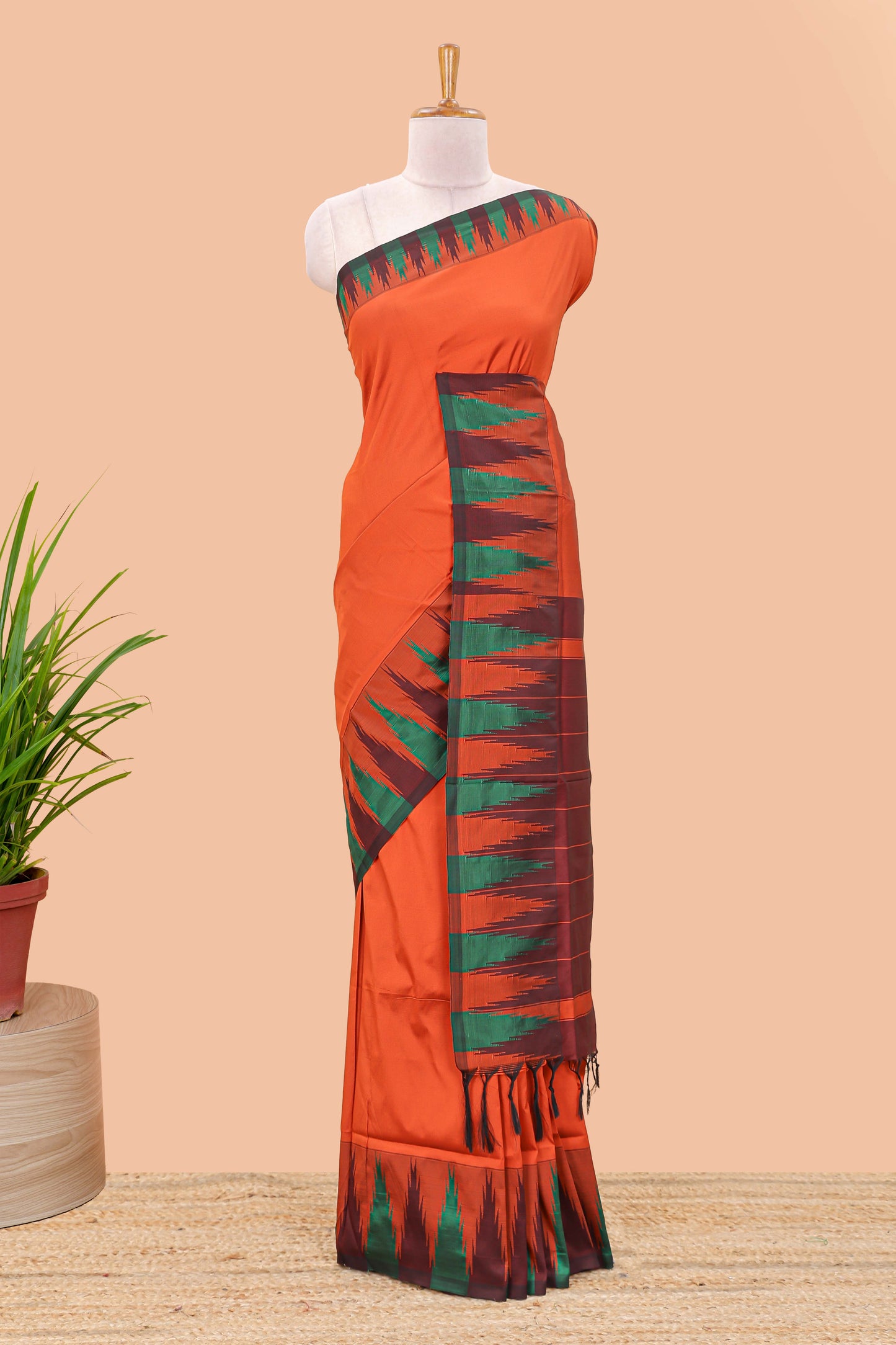 Orange plain poly cotton saree with contrast pallu and geometric border