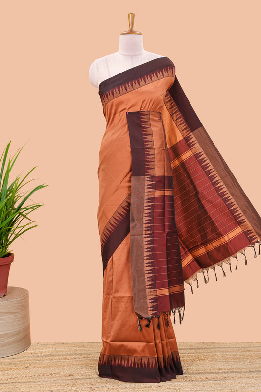 Dark orange plain poly cotton saree with contrast pallu and geometric border