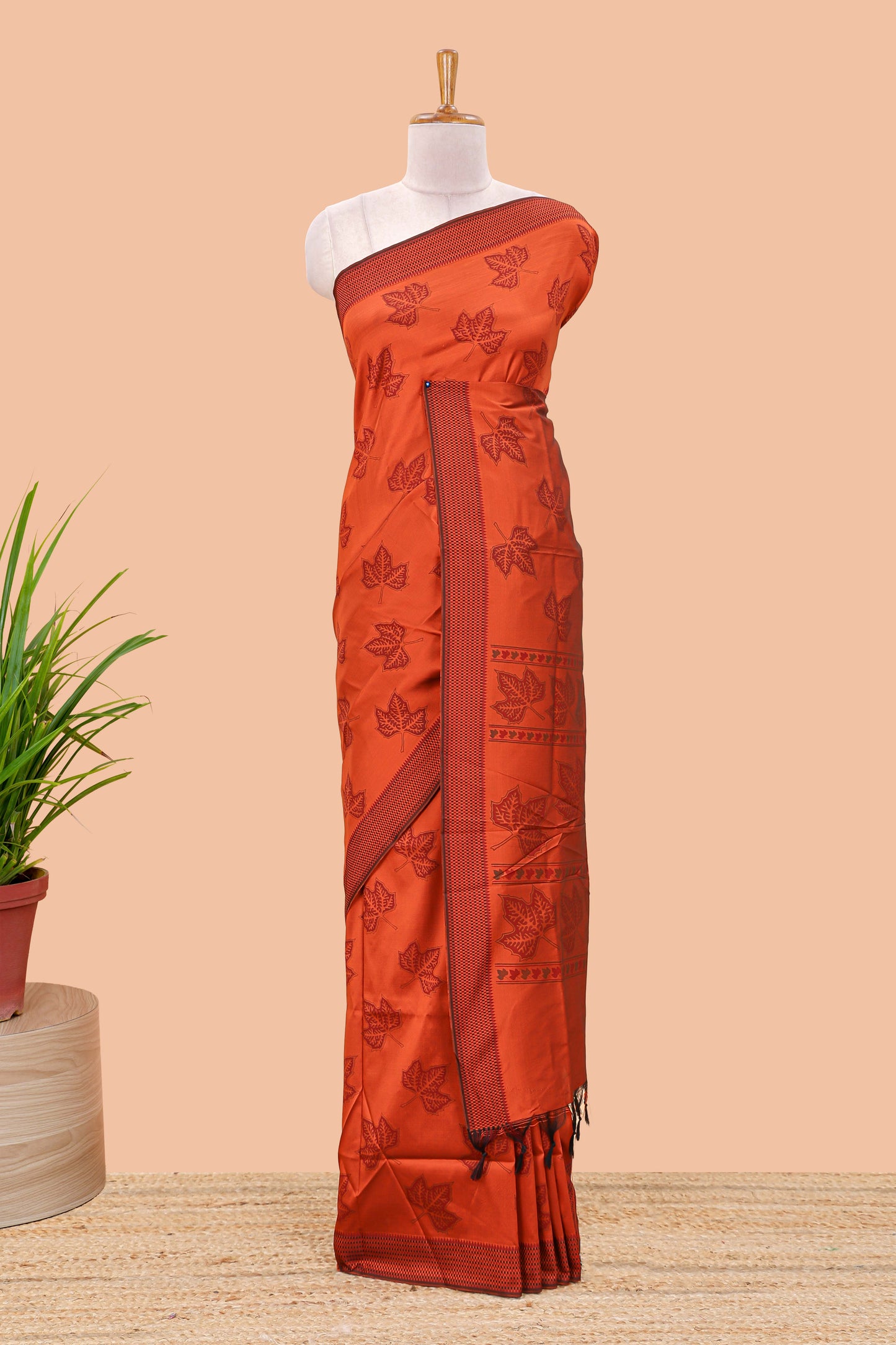 Orange leaf motifs poly cotton saree with self border and pallu