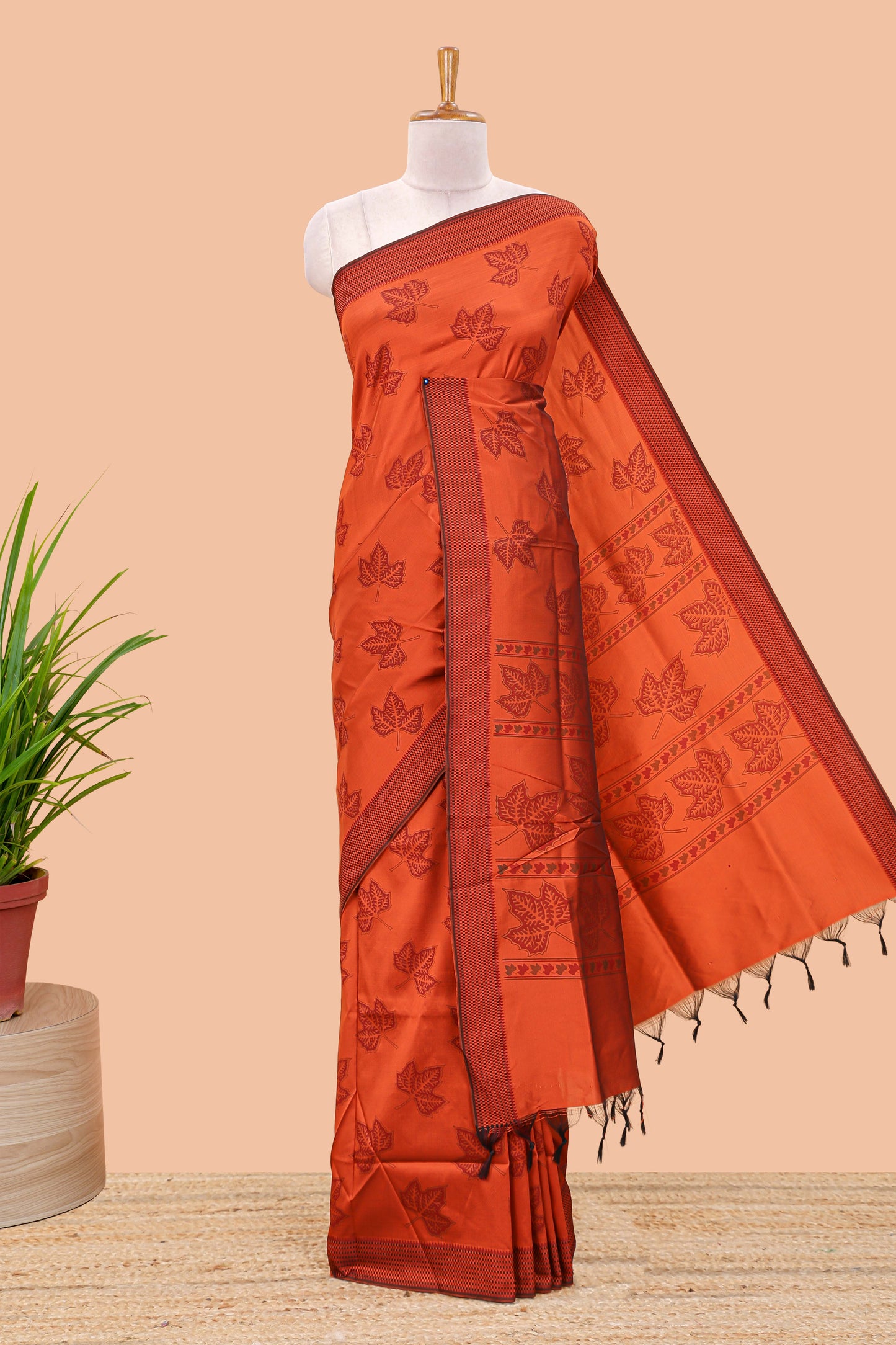 Orange leaf motifs poly cotton saree with self border and pallu