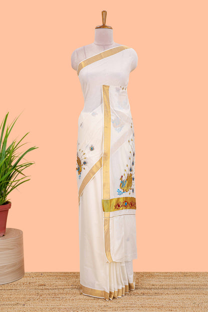 Cream kerala cotton saree with peacock design motifs and golden jari border
