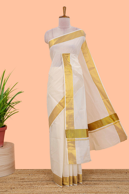 Cream kerala Cotton Saree featuring a full plain body complemented by a rich gold jari border