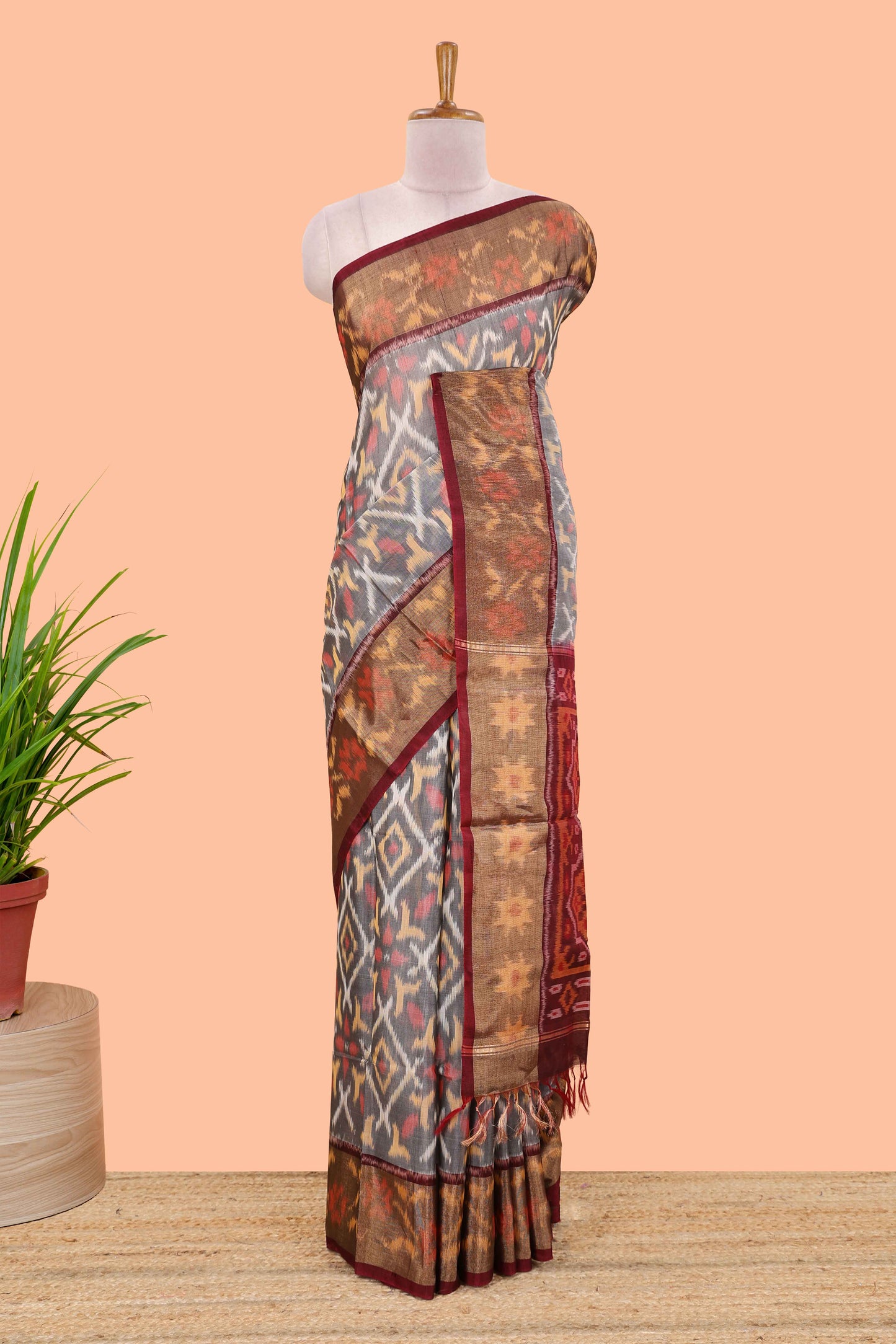 Grey ikkat cotton saree featuring traditional pochampally motifs and zari border