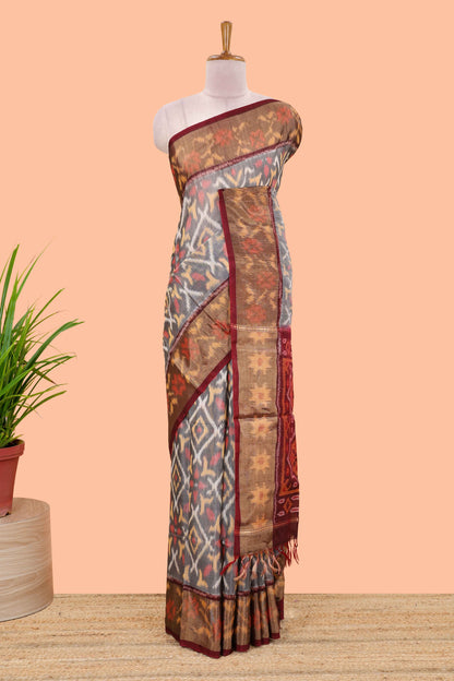 Grey ikkat cotton saree featuring traditional pochampally motifs and zari border