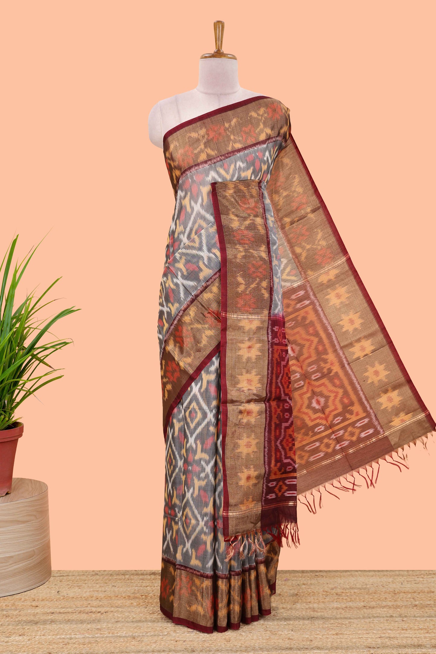 Grey ikkat cotton saree featuring traditional pochampally motifs and zari border