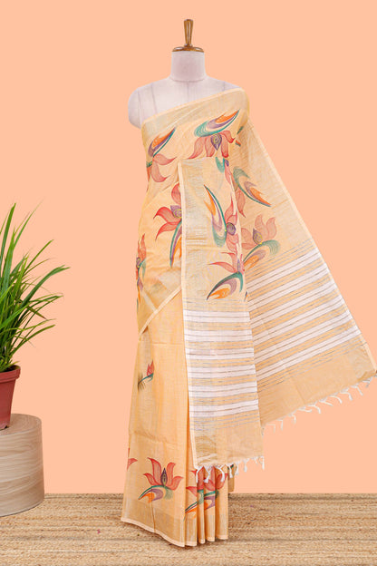 Pastel orange floral design jute cotton saree with self striped zari border and blouse