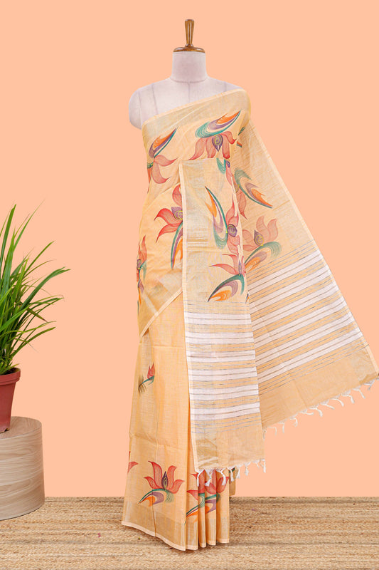 Pastel orange floral design jute cotton saree with self striped zari border and blouse