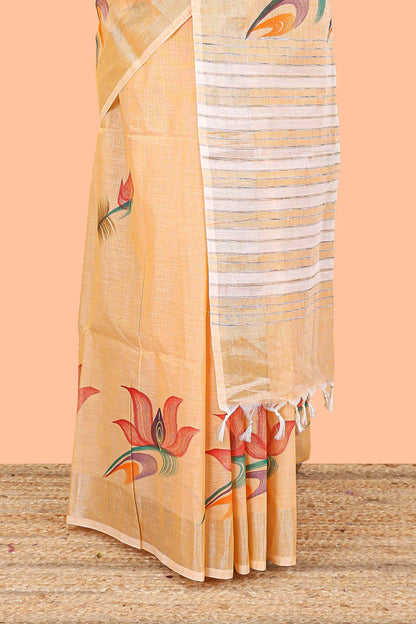 Pastel orange floral design jute cotton saree with self striped zari border and blouse