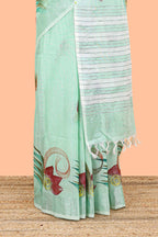 Pista green floral design jute cotton saree with self striped zari border and blouse