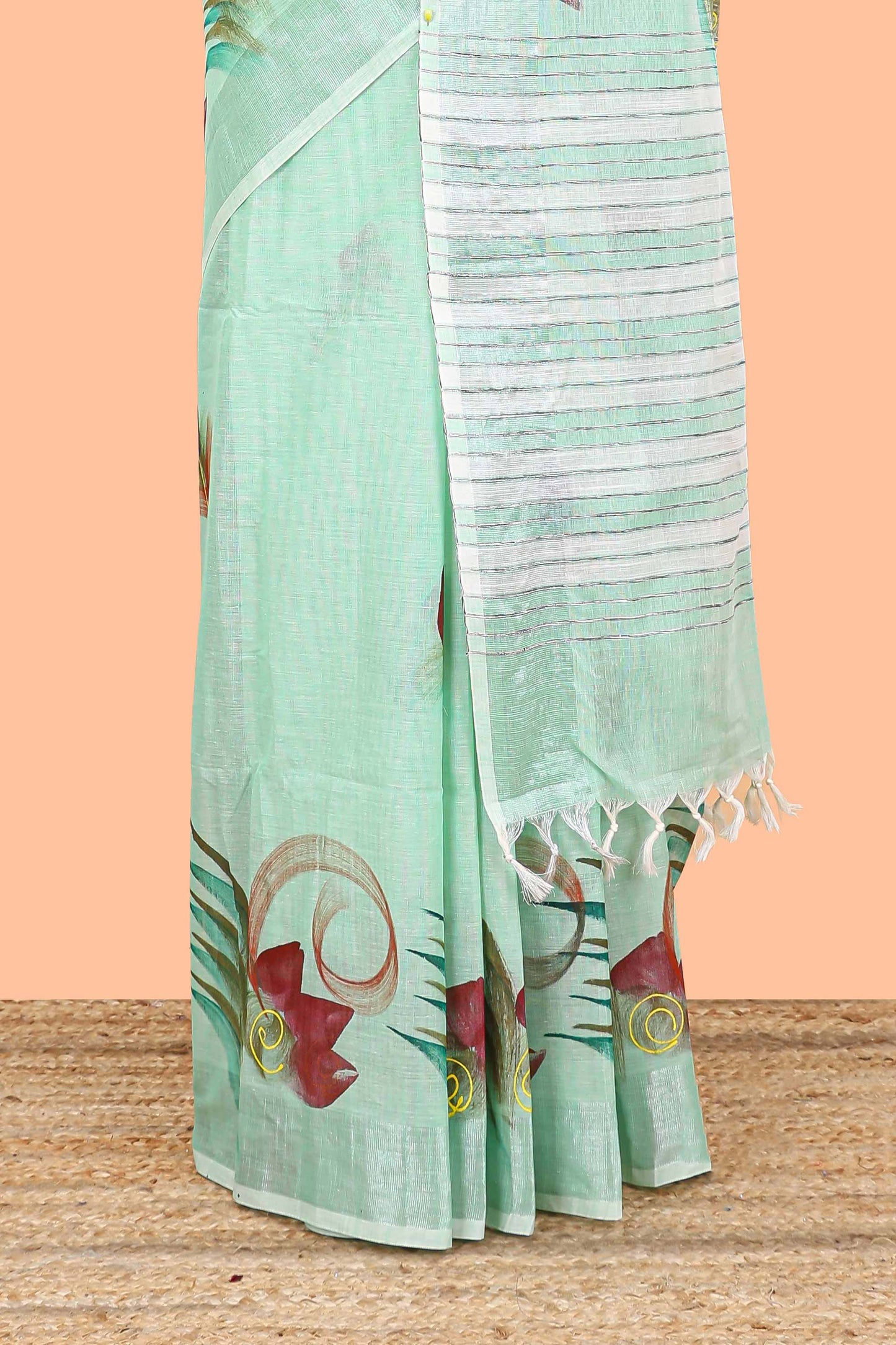 Pista green floral design jute cotton saree with self striped zari border and blouse