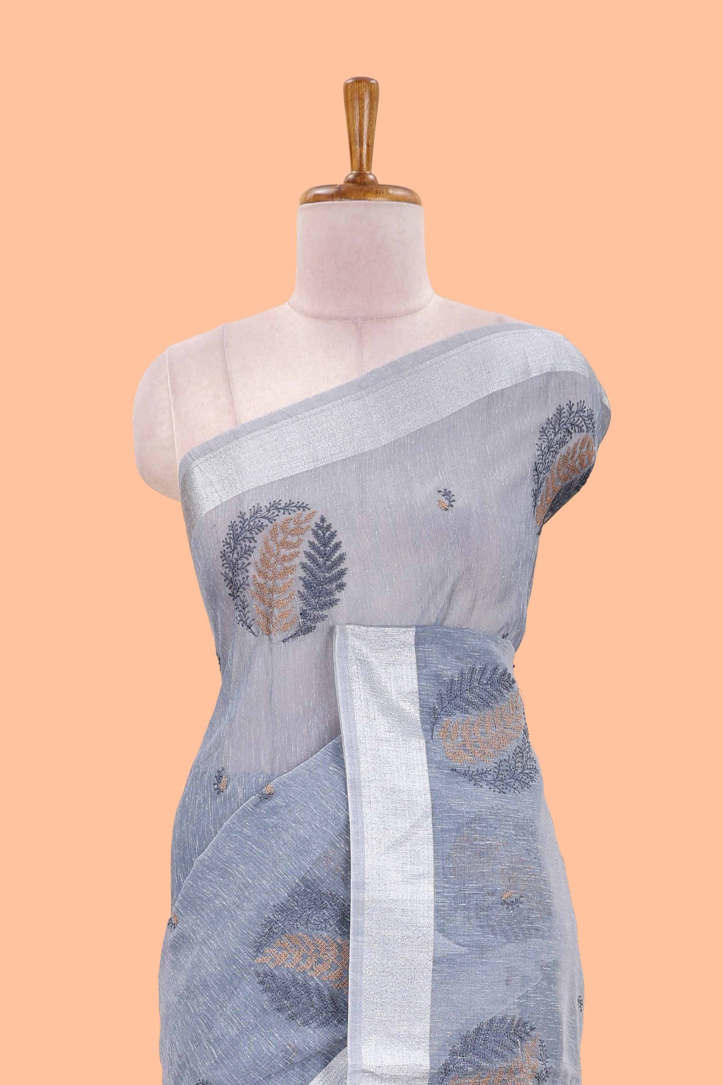 Blue jute cotton saree leaf motifs with zari border and pallu