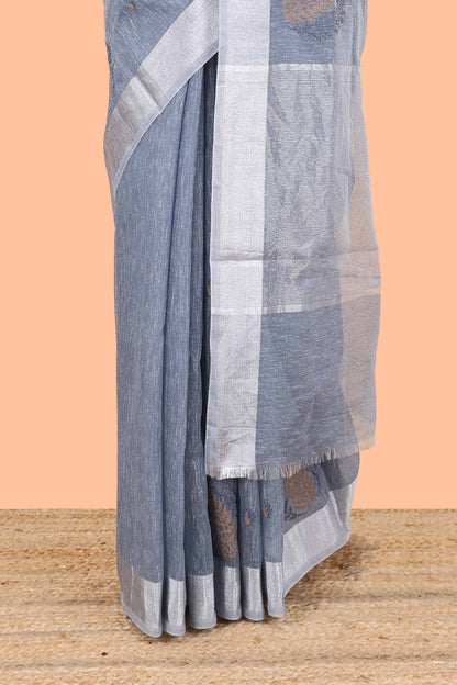 Blue jute cotton saree leaf motifs with zari border and pallu