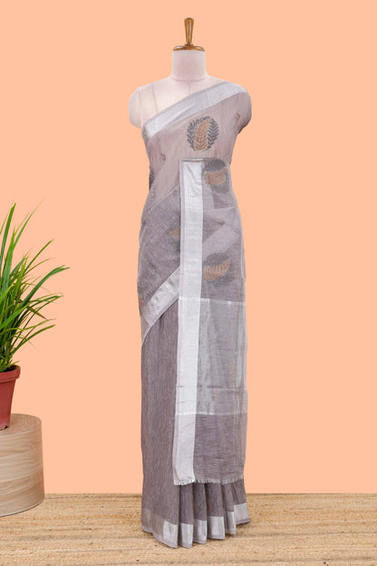 Grey jute cotton saree leaf motifs with zari border and pallu