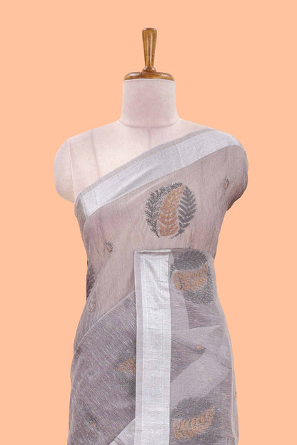 Grey jute cotton saree leaf motifs with zari border and pallu