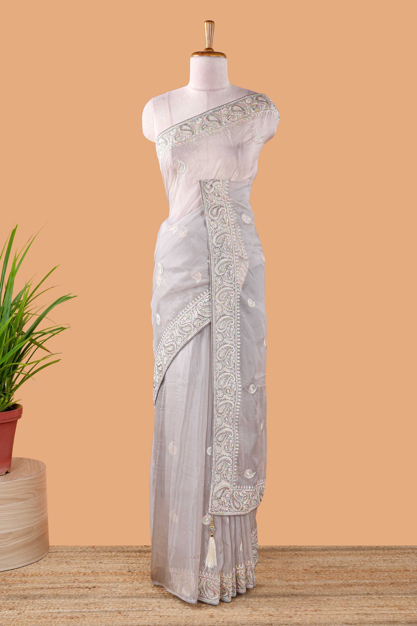 Grey organza crush saree with leaf embroidery design, self pallu and blouse