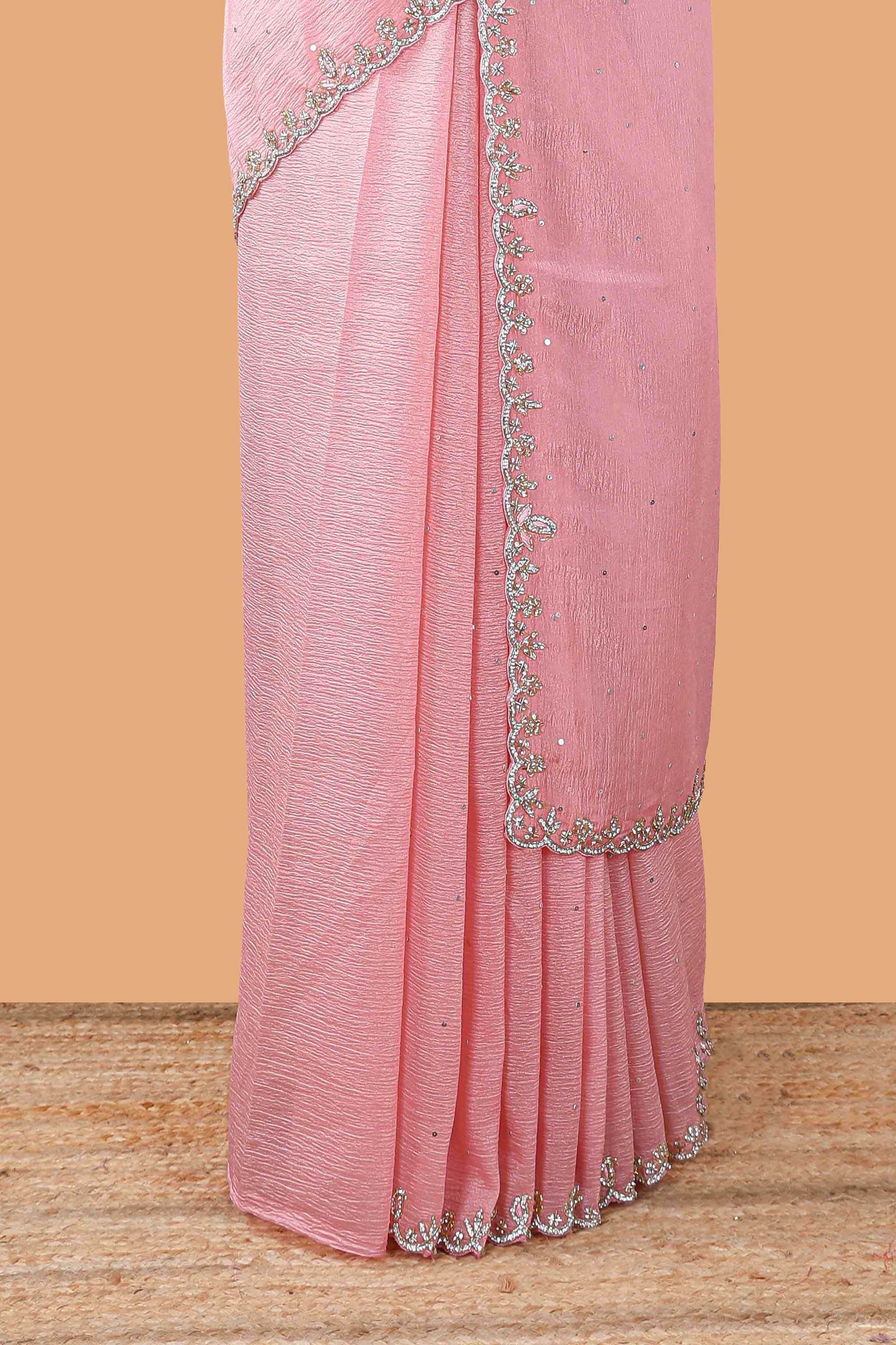 Pink organza crush saree with dot motif embroidery and stone work