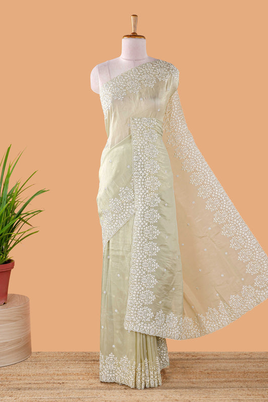 Green organza crush saree with dot motif embroidery and stone work