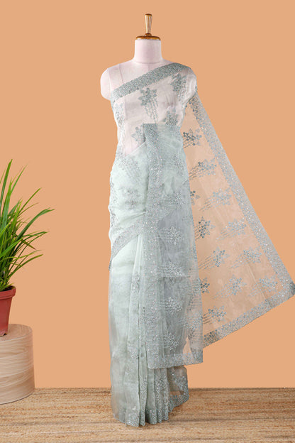 Green organza crush saree with floral embroidery and stone work