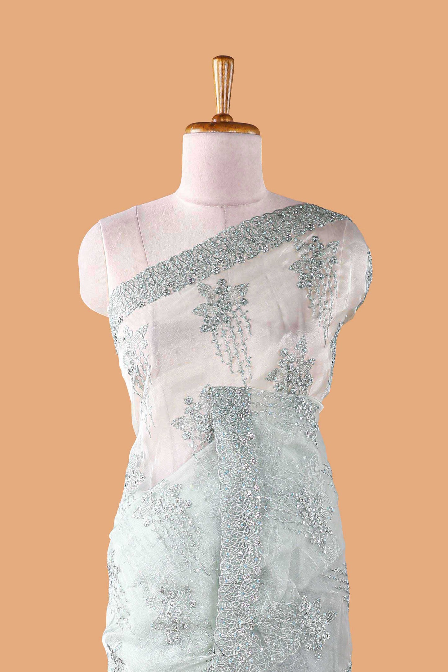 Green organza crush saree with floral embroidery and stone work