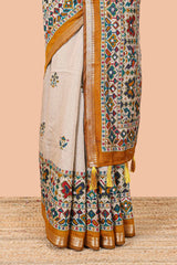 Cream chanderi cotton saree with mustard zari border