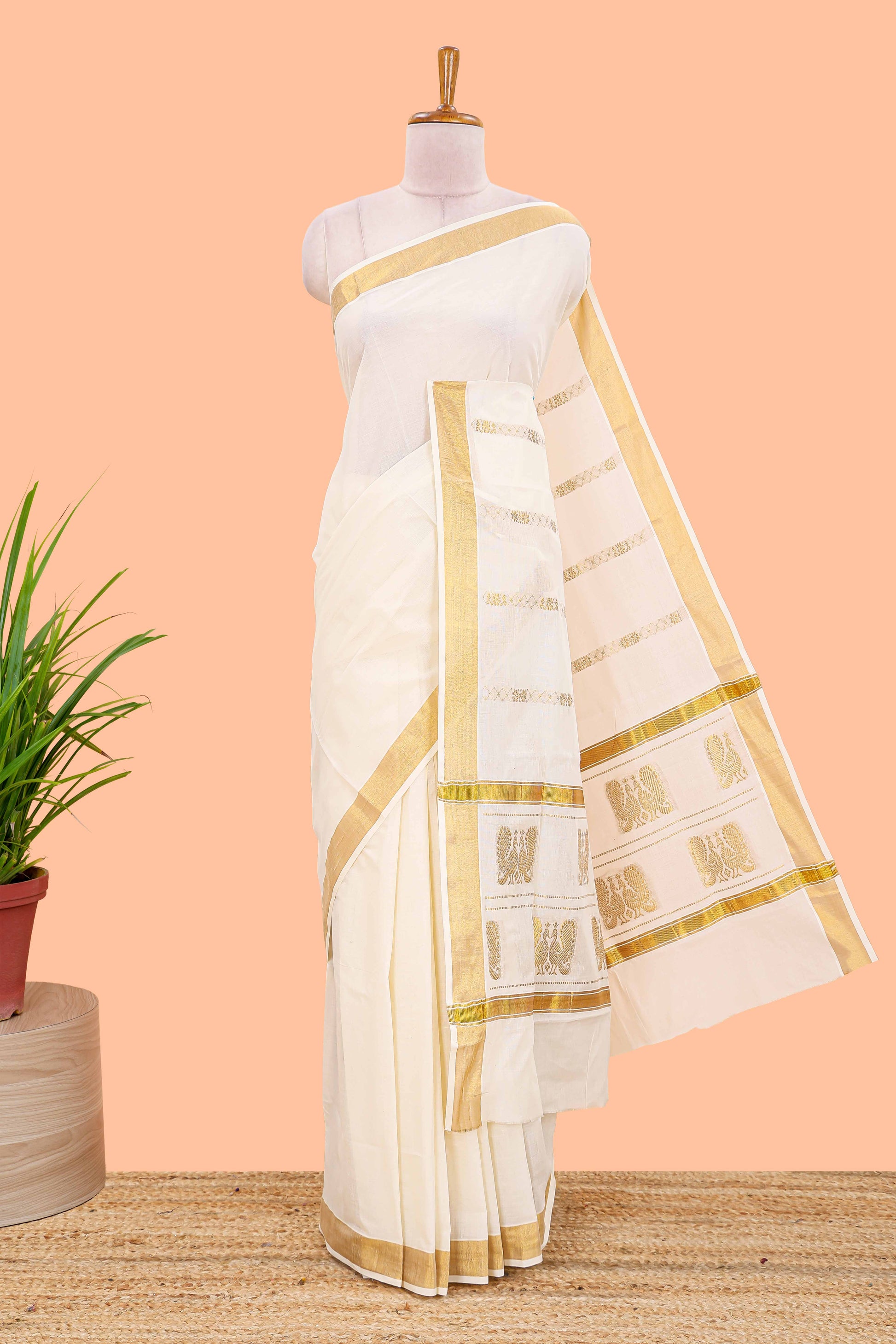 Cream peacock design Kerala cotton saree