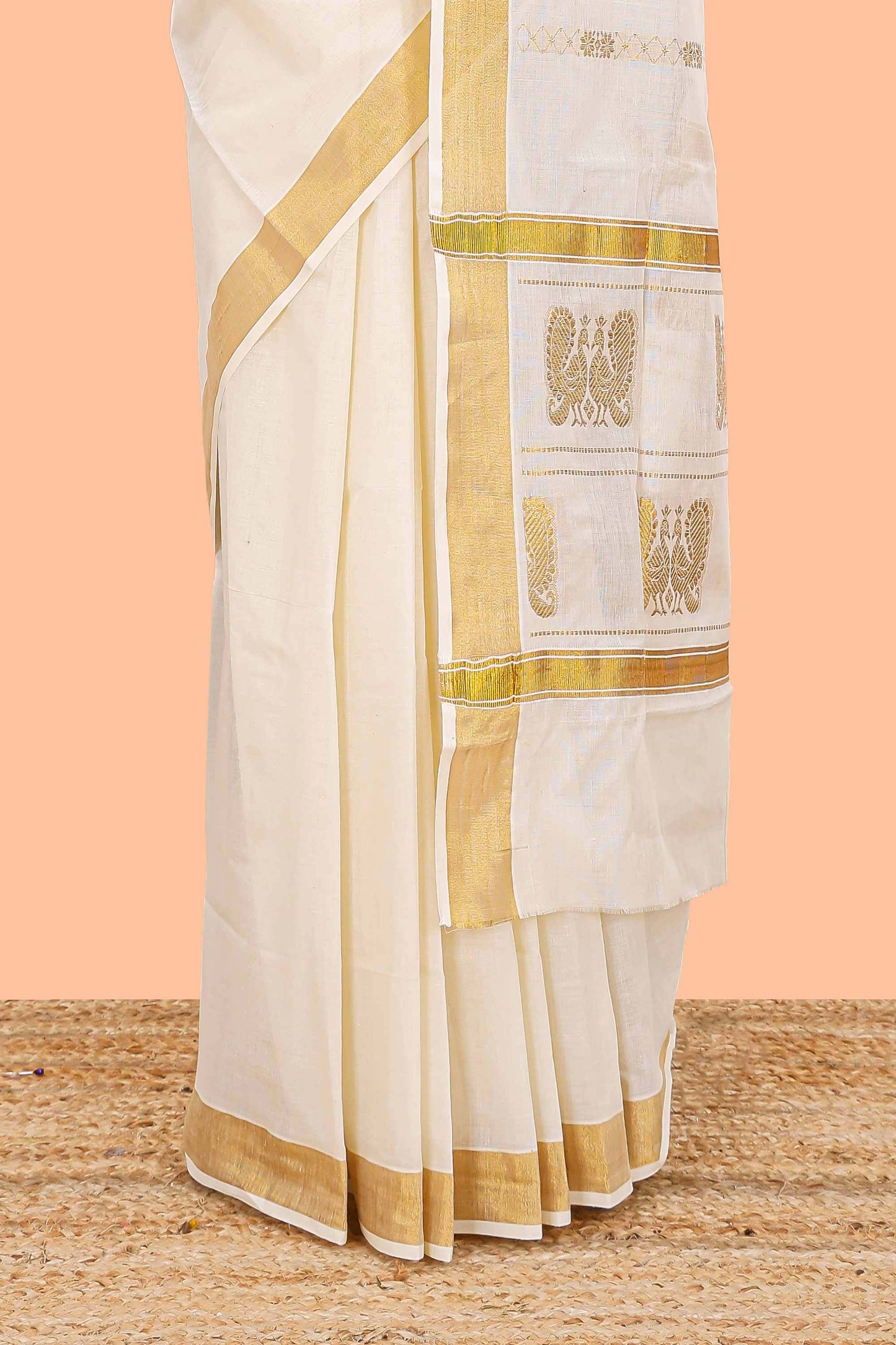 Cream peacock design pallu saree