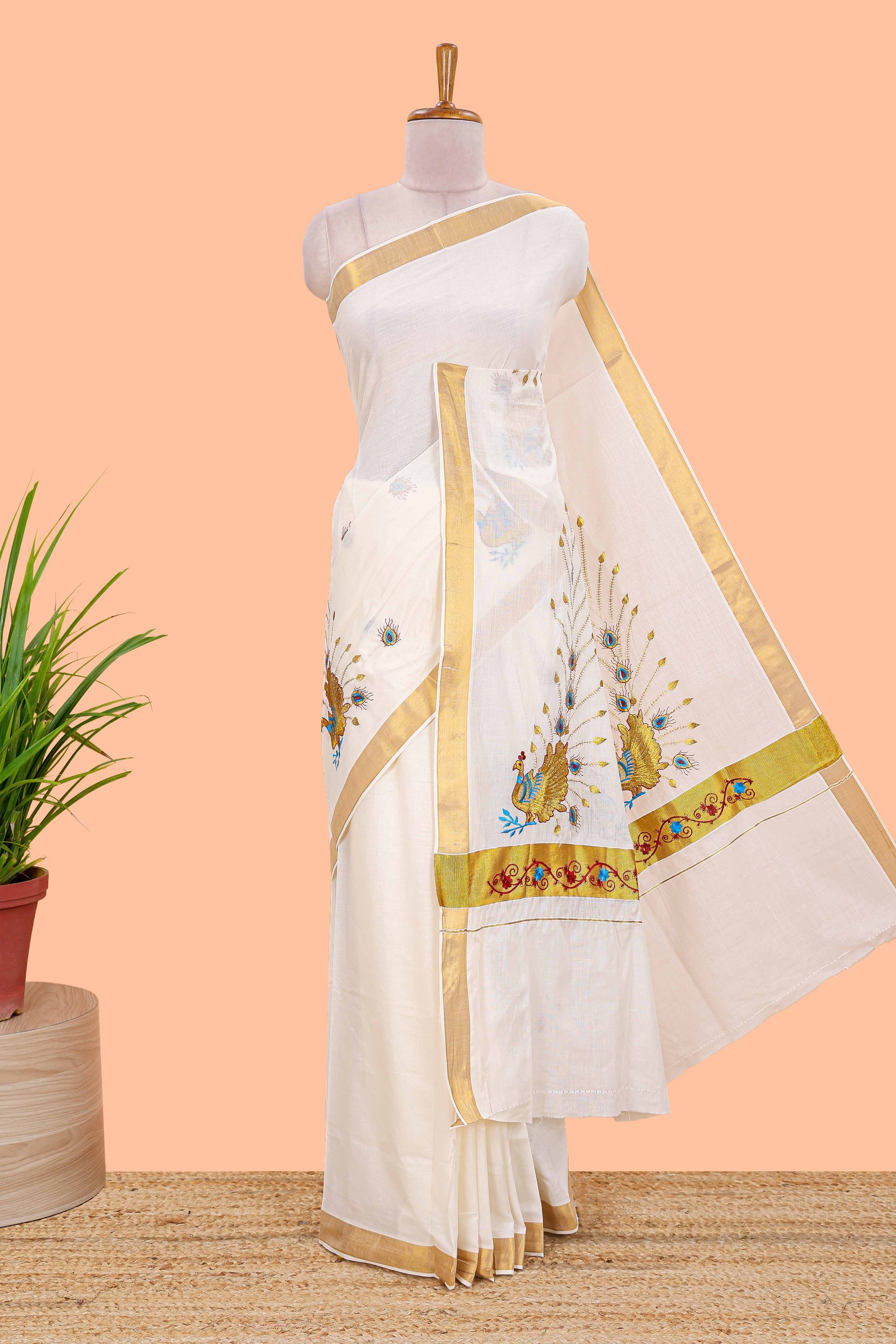 Cream peacock motif Kerala cotton saree