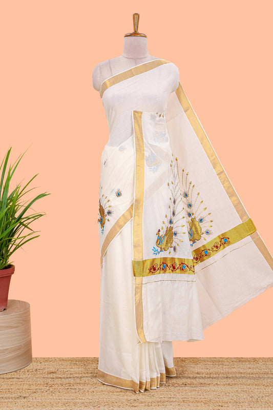 Cream peacock motif Kerala cotton saree