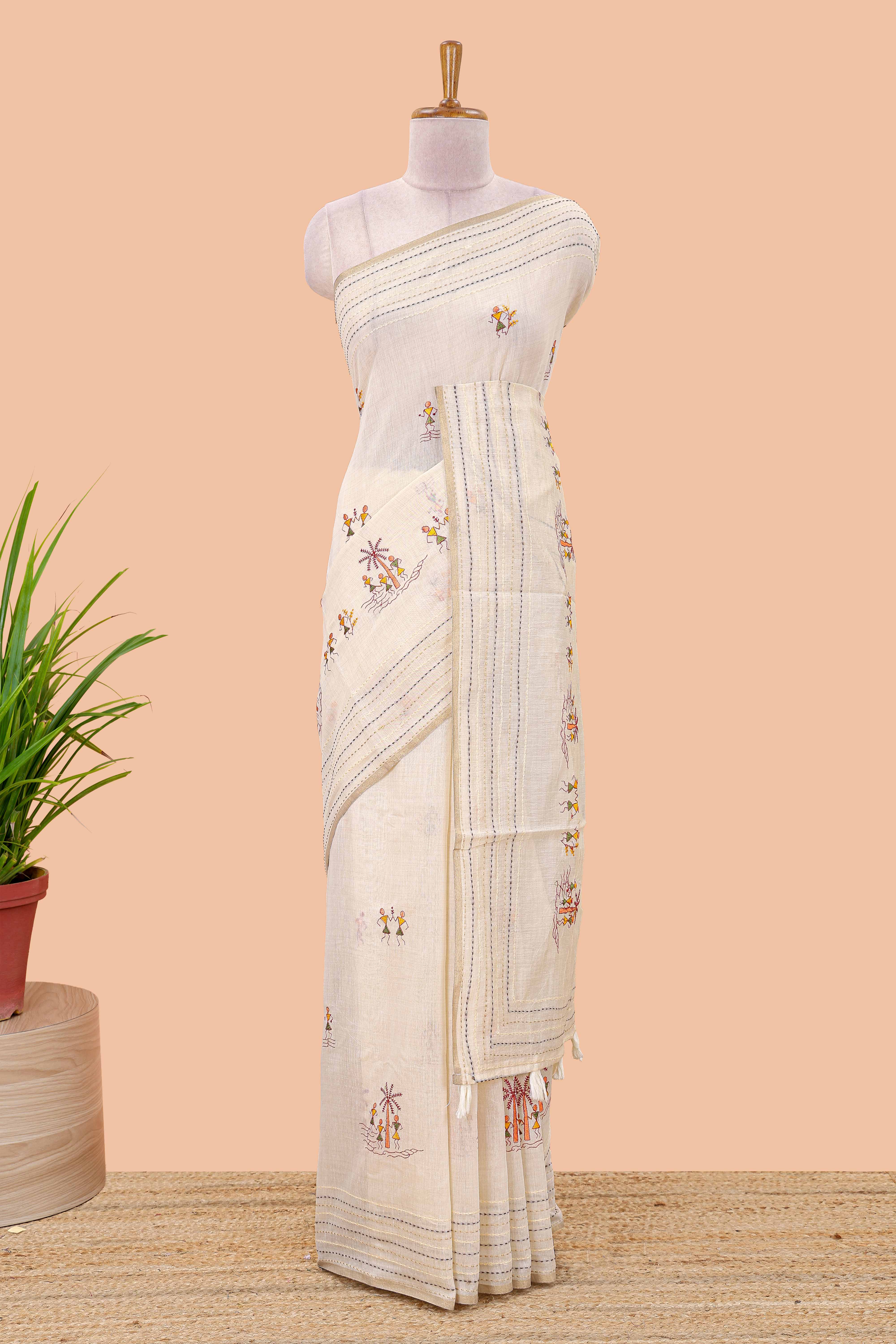 Cream warli art embroidered chanderi cotton saree with vertical stitched pallu