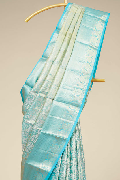 Elegant ivory gold traditional silk saree