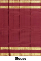 
Elegant rust orange Kanchipuram saree