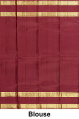 Elegant rust orange Kanchipuram saree