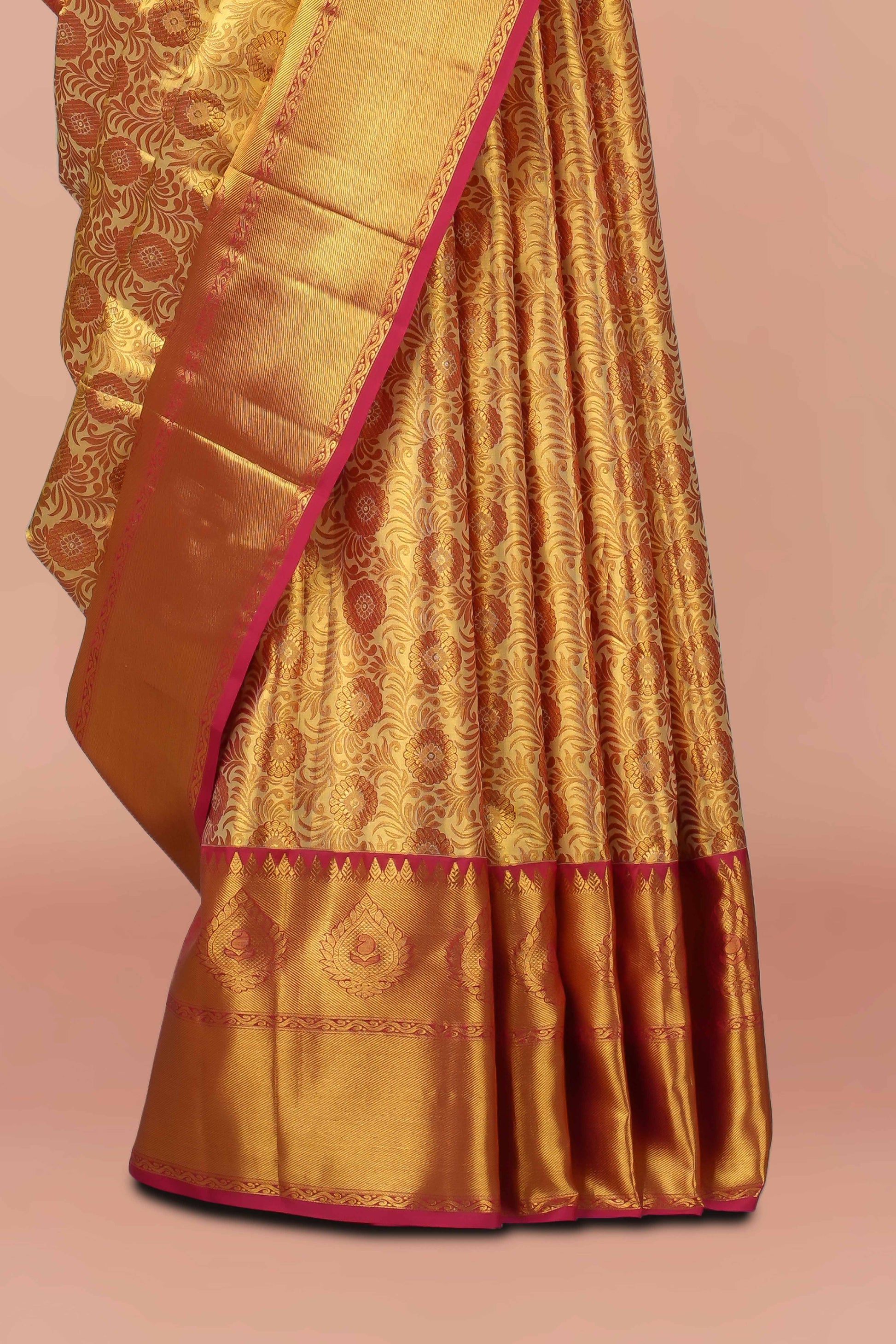 Gold silk saree with red border
