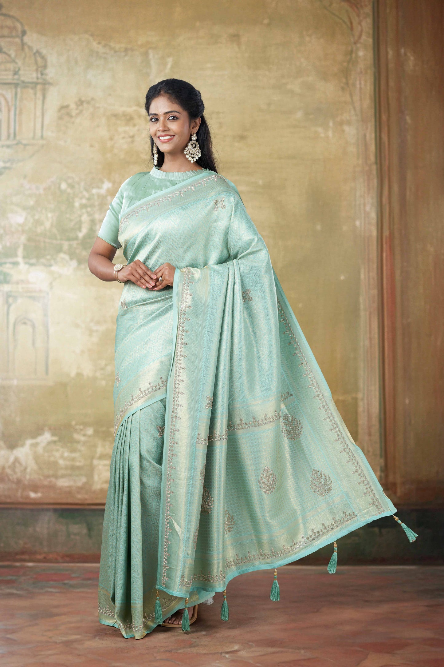 Green Zari border accents