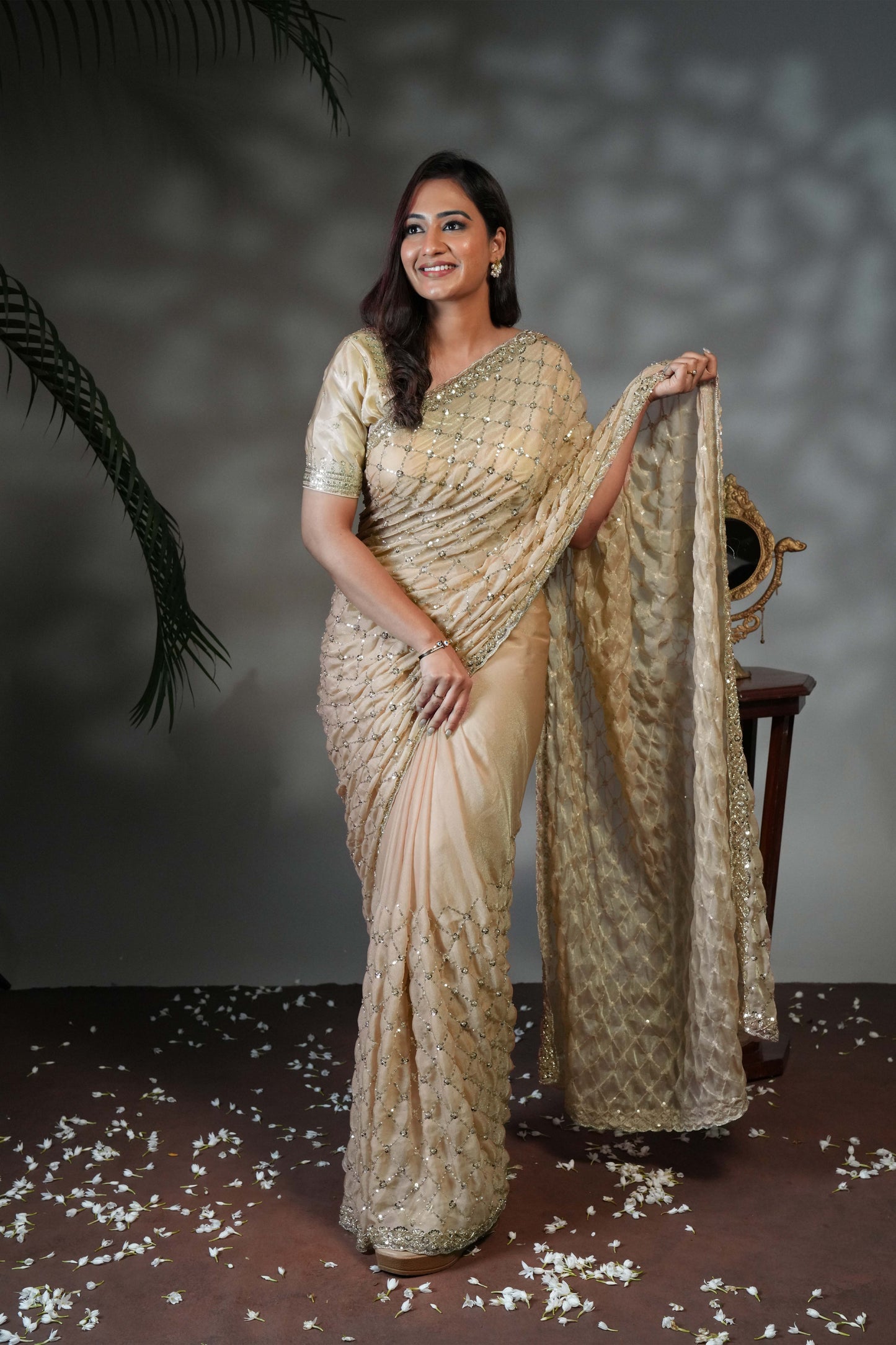 Green embellished party saree