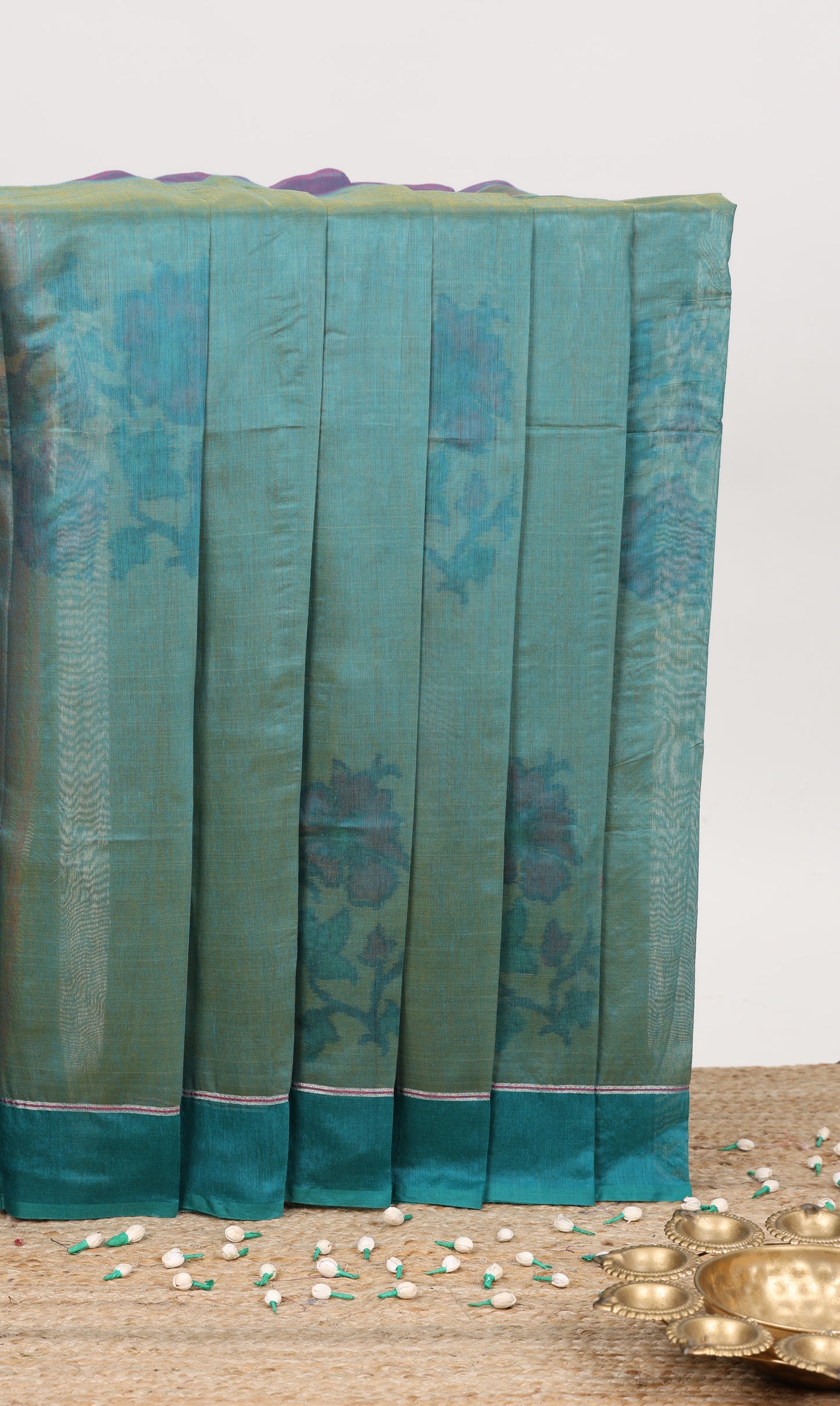 Green floral motifs ikkat cotton saree
