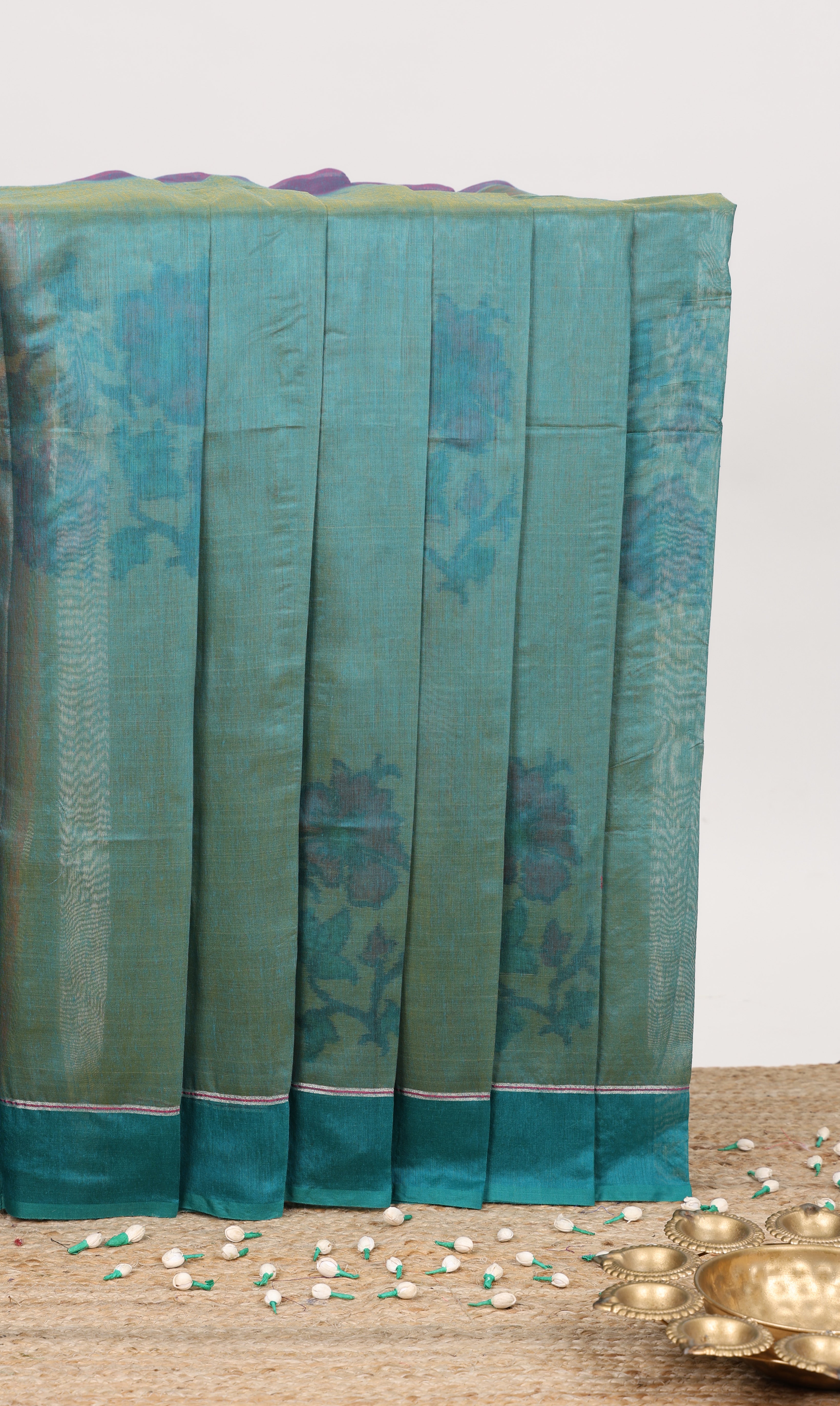 Green floral motifs ikkat cotton saree
