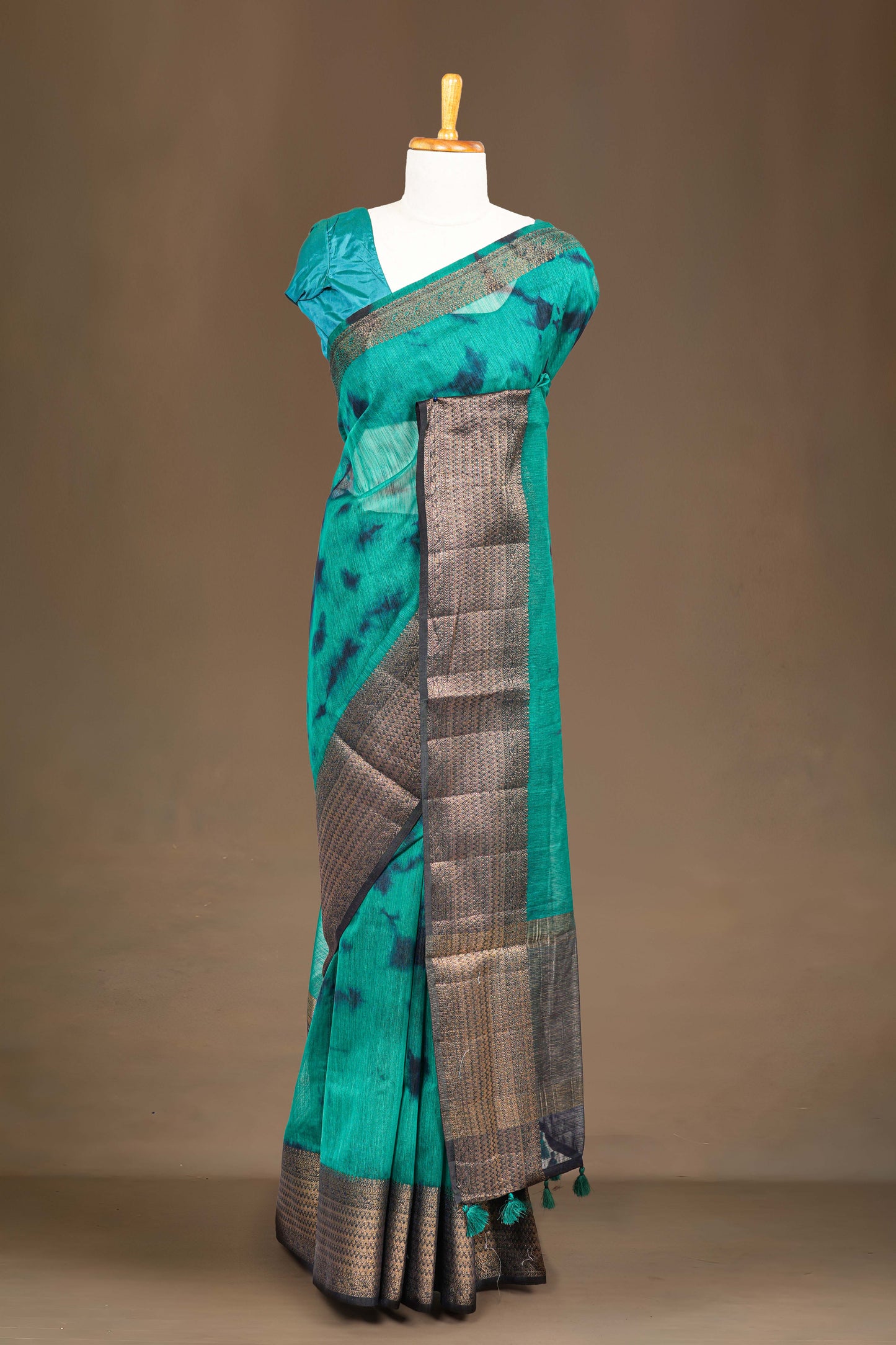 Green linen saree with jacquard border