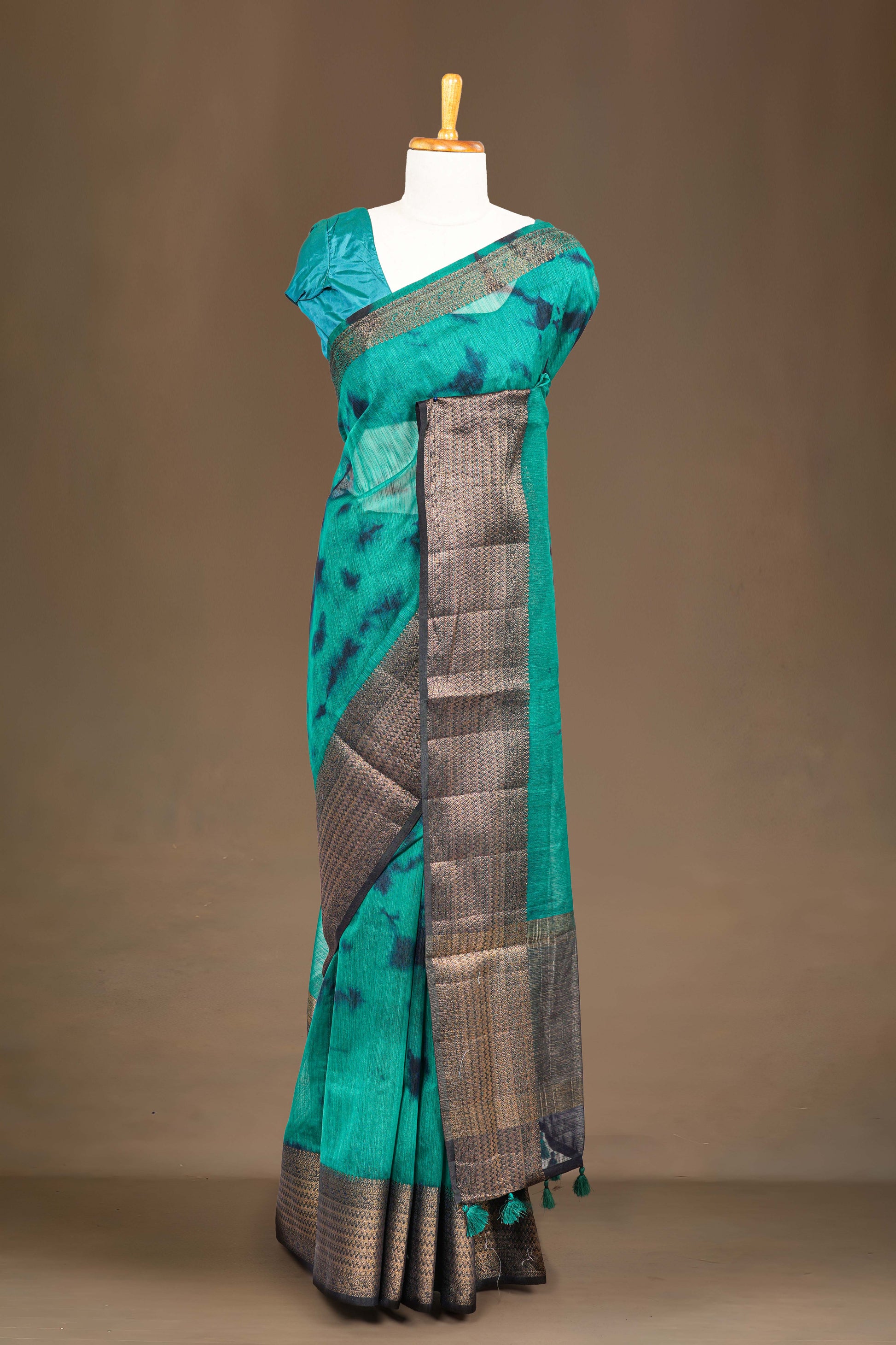 Green linen saree with jacquard border