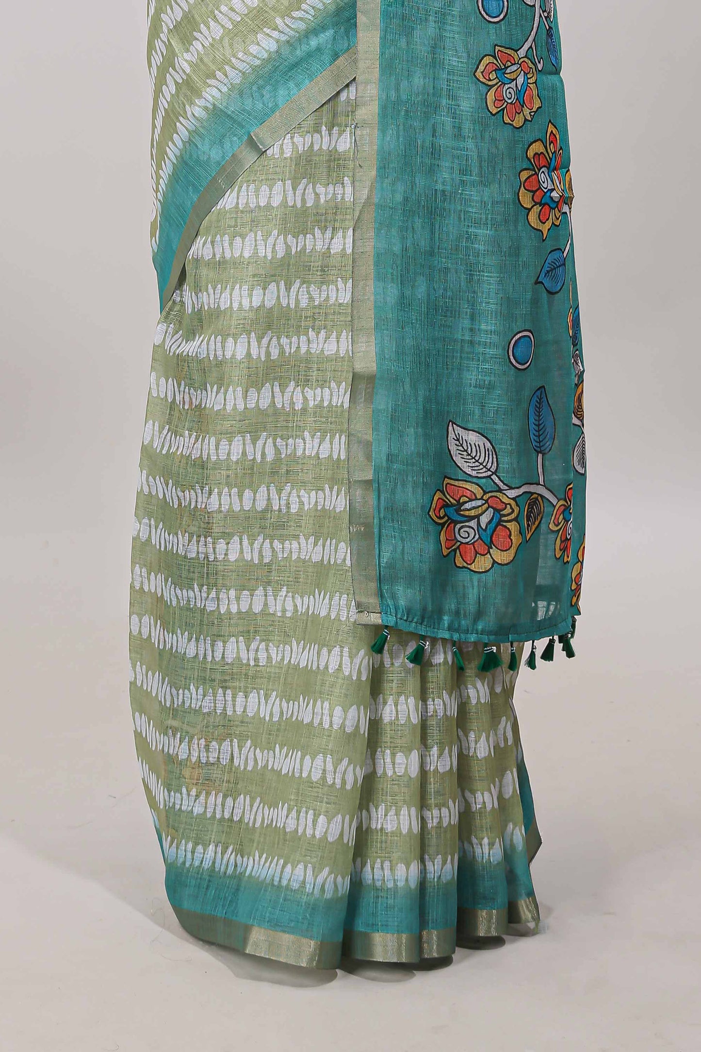 Green linen sarees with self zari border
