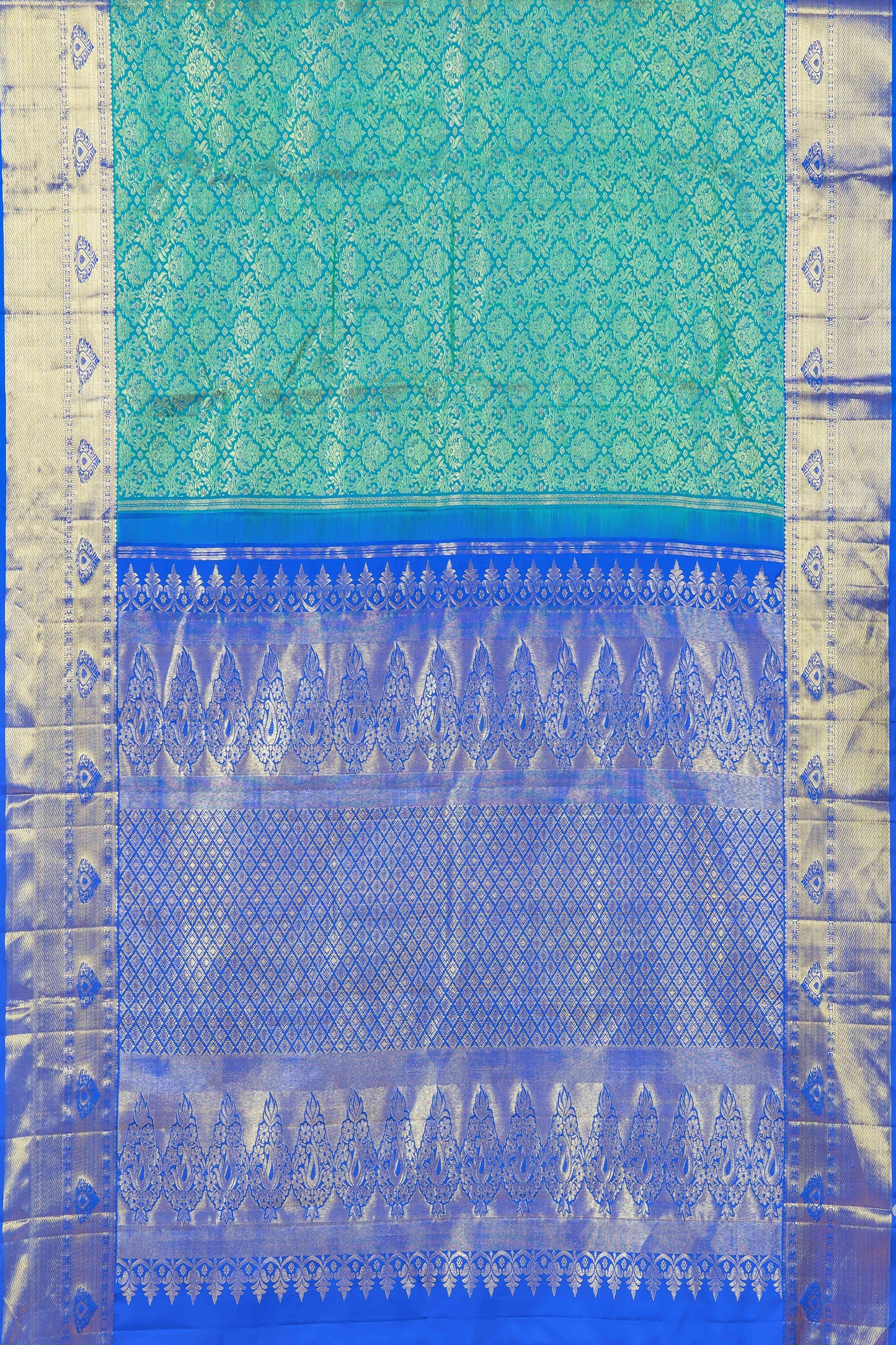 Green silk saree with leaf design