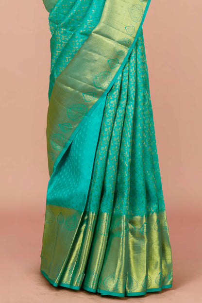 Green zari border silk saree
