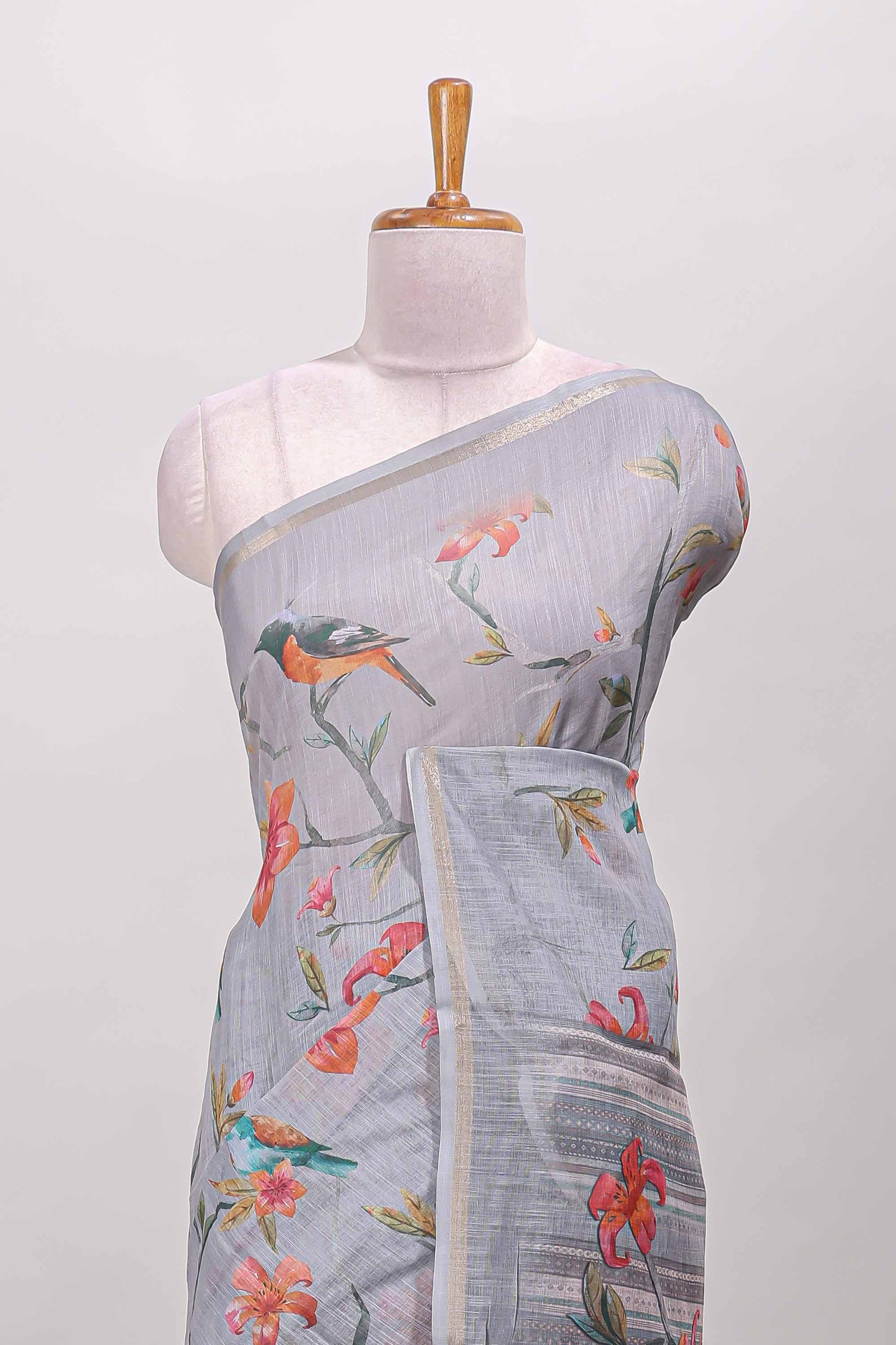 Grey linen saree with self zari border