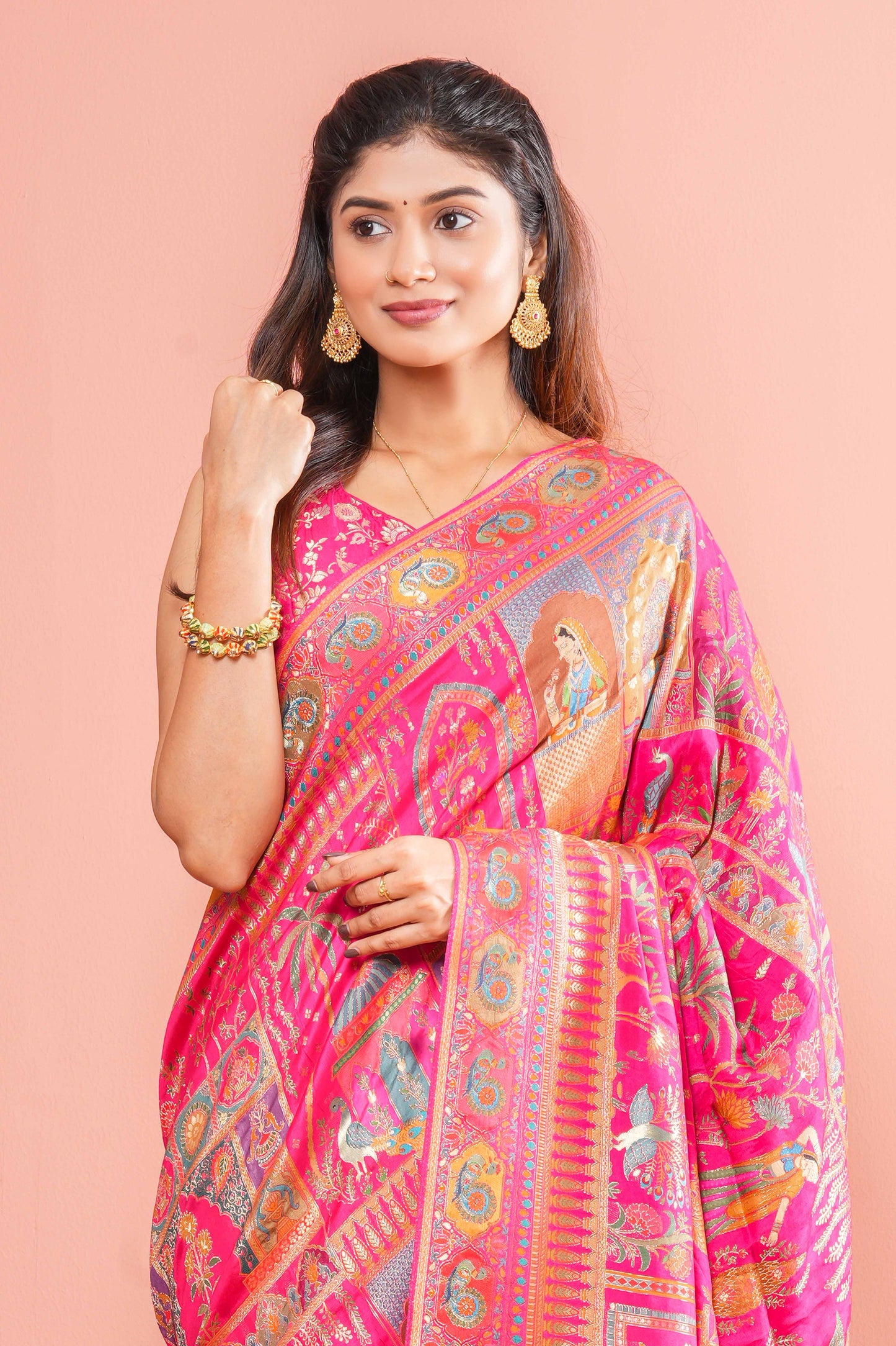 Intricate zari peacock motifs 