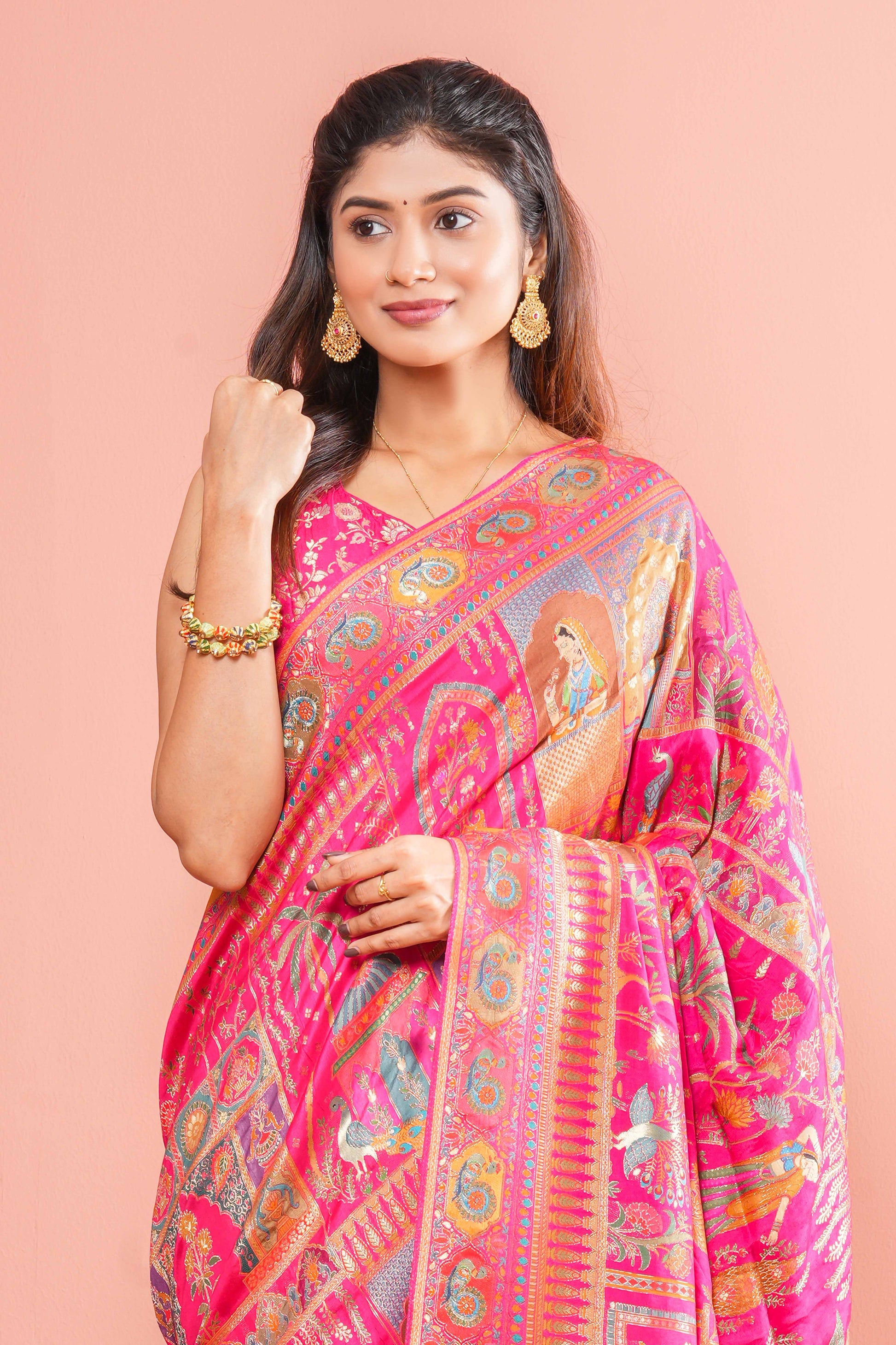 Intricate zari peacock motifs 