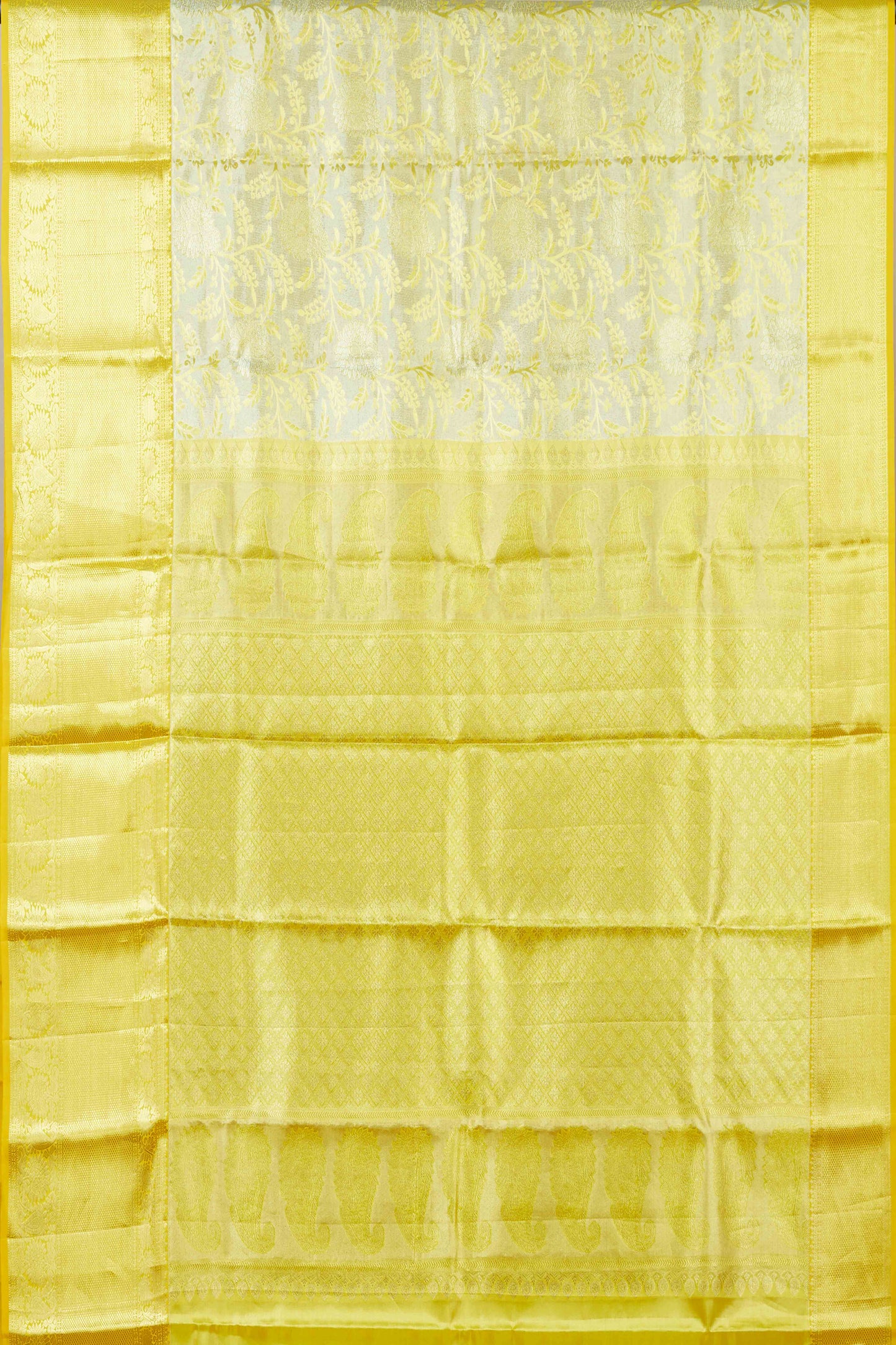 Ivory tissue silk saree with zari work