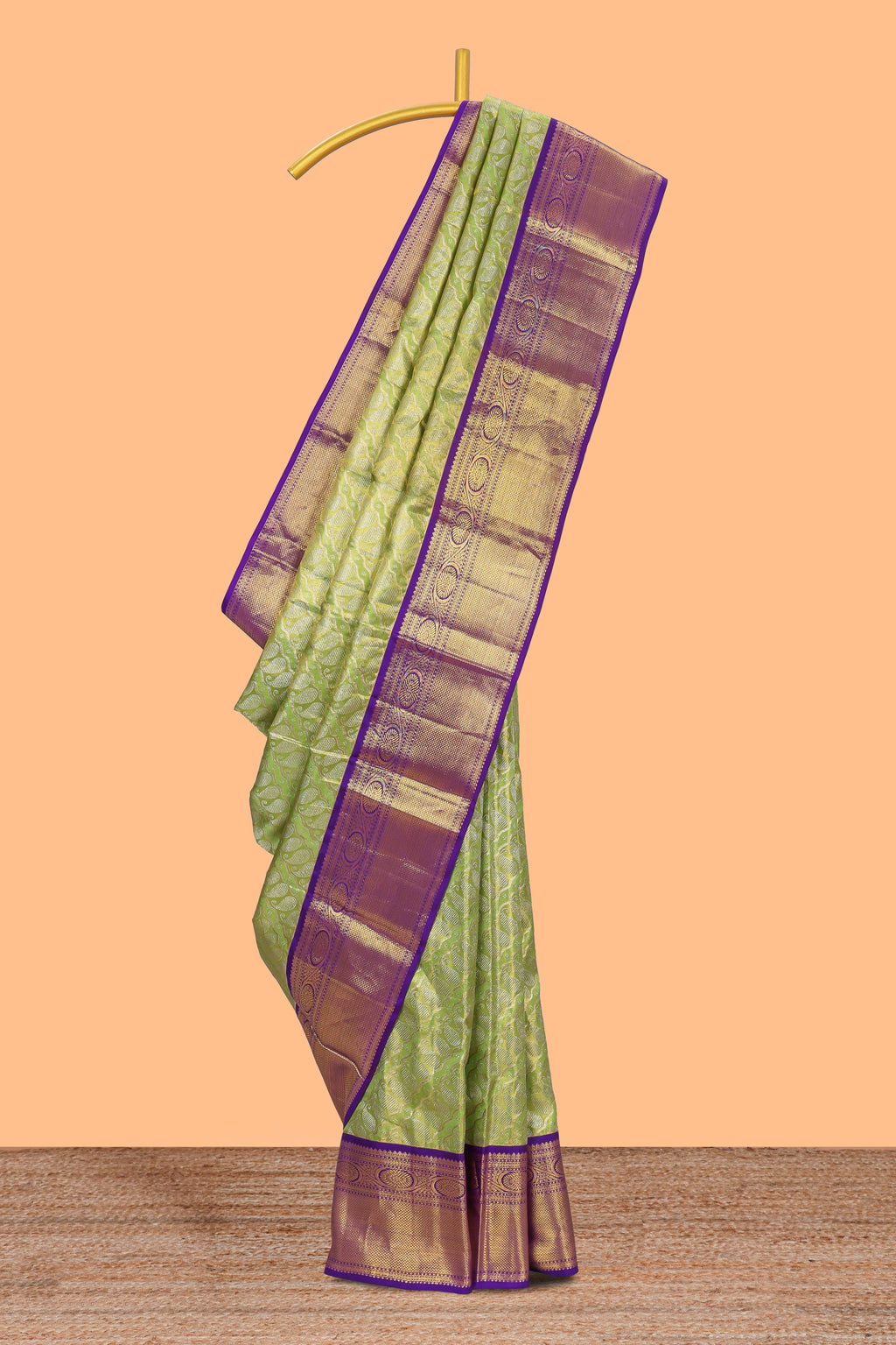 Parrot green paisley pattern Kanchipuram traditional silk saree with contrast zari border and zari pallu comes with blouse